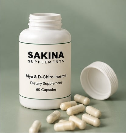 Open Sakina bottle with plant capsules spilled beside it
