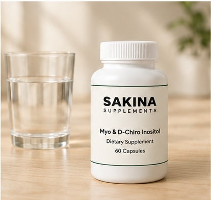 Sakina bottle on a kitchen counter next to a glass of water